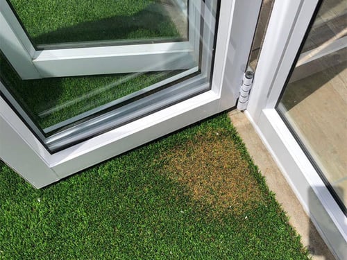 artificial turf burned by window glare